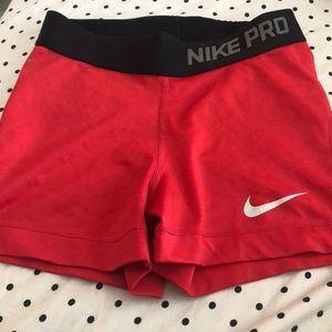 red nike pros